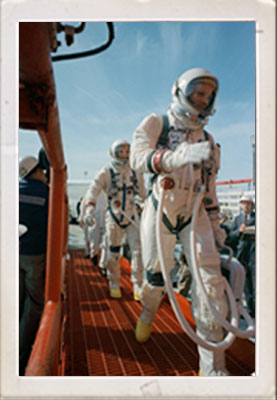 Commander Neil Armstrong (right) and pilot David R. Scott prepare to board the Gemini-Titan VIII.