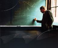 In 1974, Neil Armstrong writes on a chalkboard in the UC College of Engineering. Photo Credit: Peggy Palange, UC Public Information Office