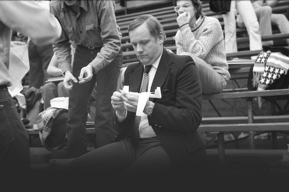 Armstrong creates a paper airplane at an event hosted by the American Institute of Aeronautics and Astronautics student chapter. Photo of Armstrong by Ralph Spitzen (Eng '74, MBA '76)