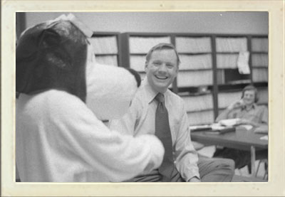 Armstrong greets Snoopy as part of an event.