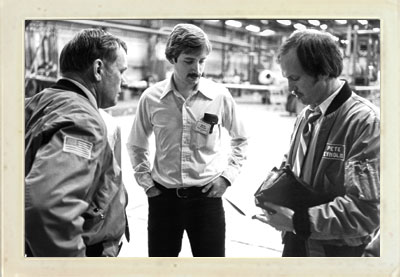 Neil Armstrong, left, Mark Stear, and Pete Reynolds at Learjet. February 1979.